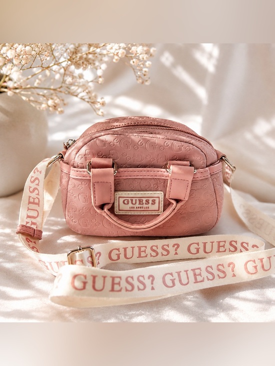 Guess Handbags - GUESS Pink Embossed Mini Crossbody Bag with Branded Strap